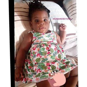 Picture of baby girl in leafy dress